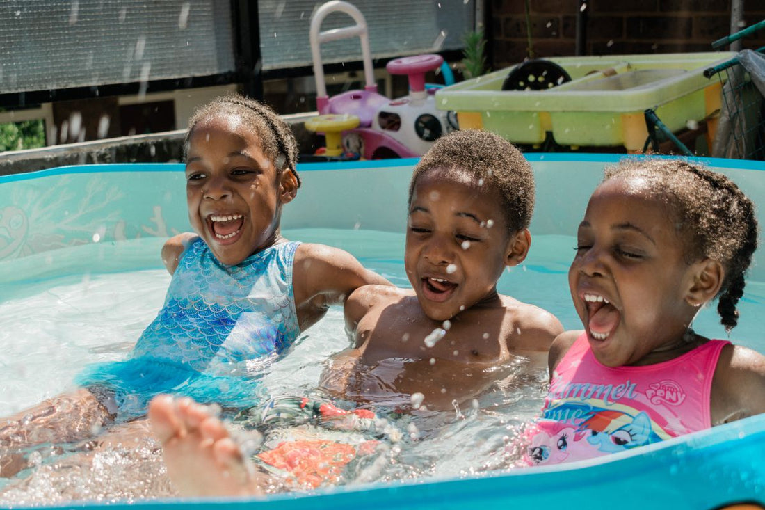 children playing inflatable pool